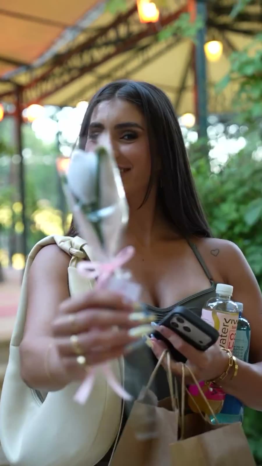 A guest being welcomed at an Aura Studio event