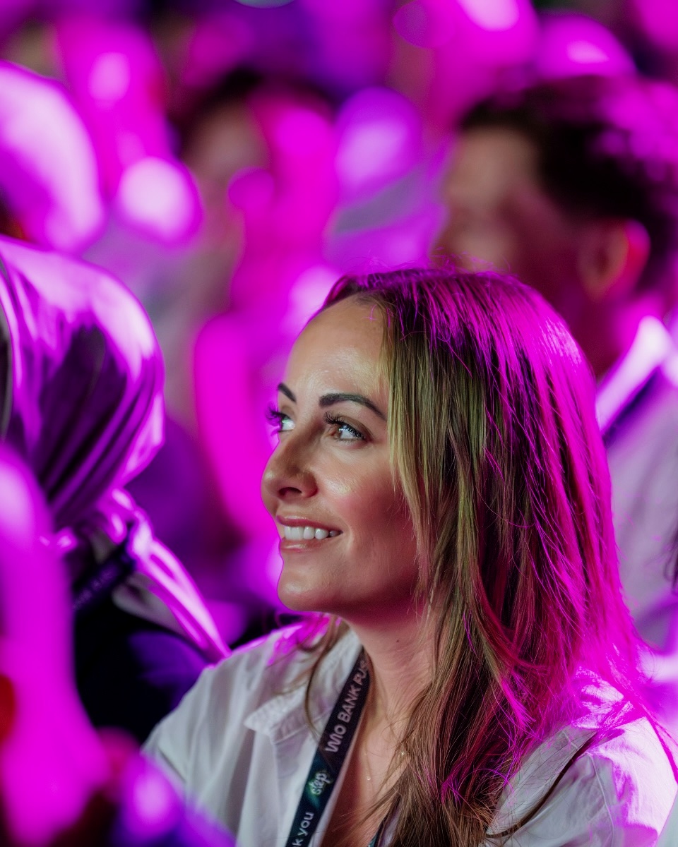 The audience under the pink light, 2025